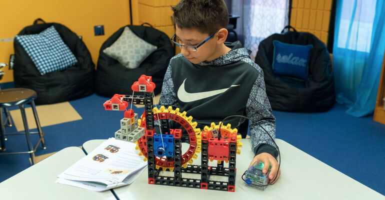 With a combination of hardware and software, students can add physical input sensors and output modules to their design process and control them using code they’ve written.