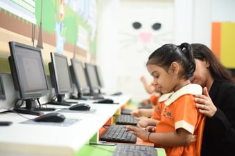 A preschooler learns STEM in the computer lab
